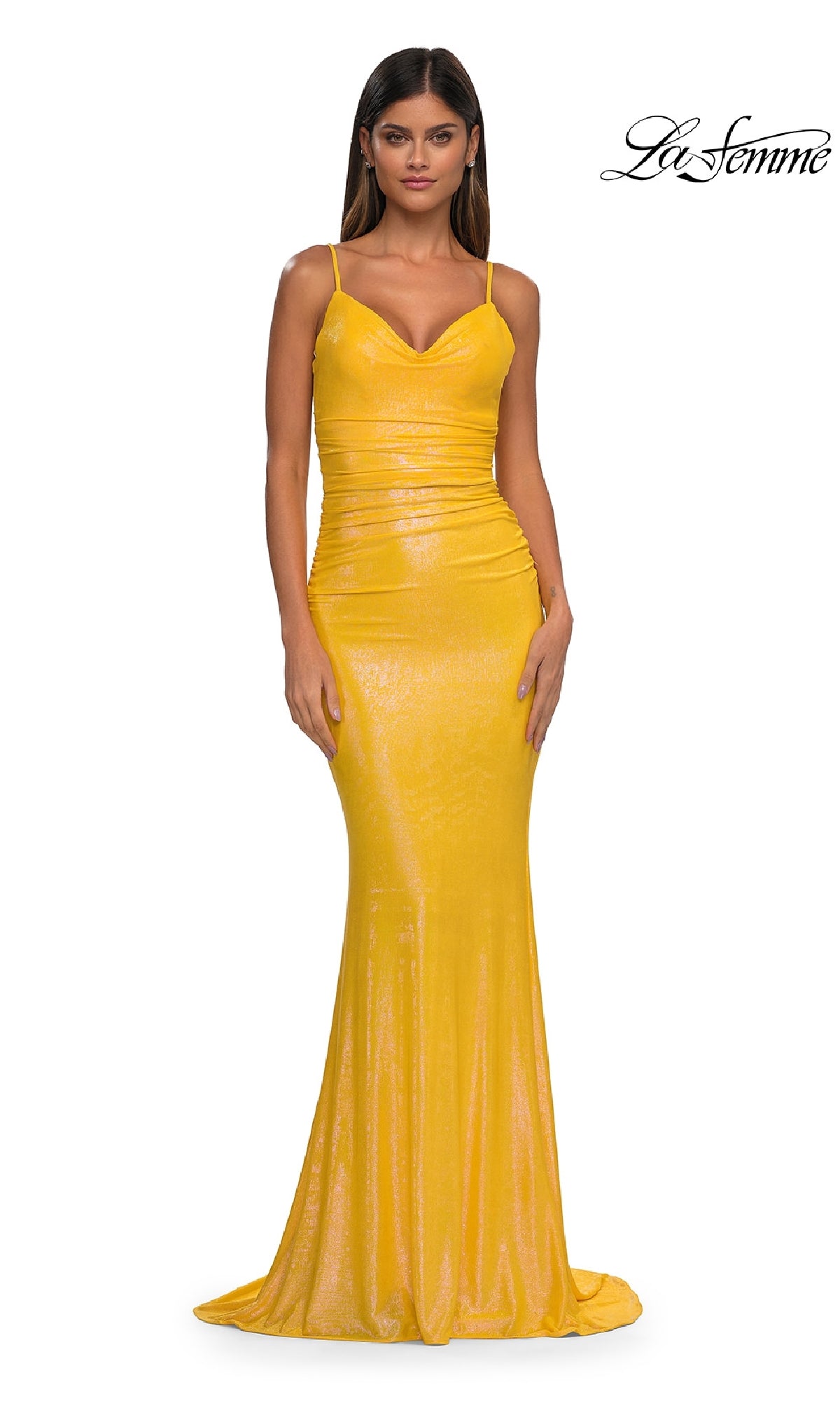 A woman stands facing forward in the Tight Long Metallic Prom Dress: La Femme 33034, a yellow, floor-length bodycon dress with thin straps. The background is plain white with the